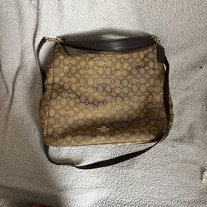 Gently used Coach purse with classic design.